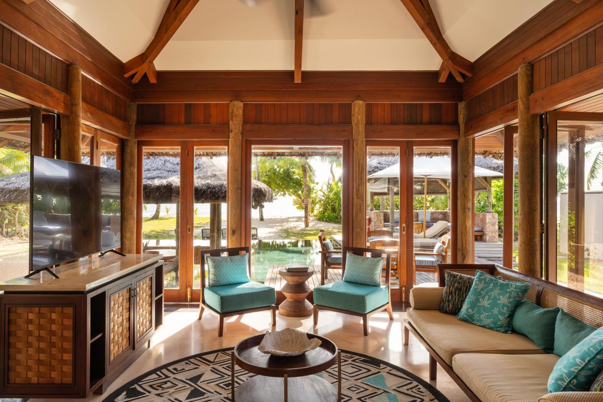 Constance Lemuria Grand Anse  Esterno foto Living room of a Beachfront Villa